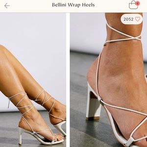 White lace-up Free People heels.